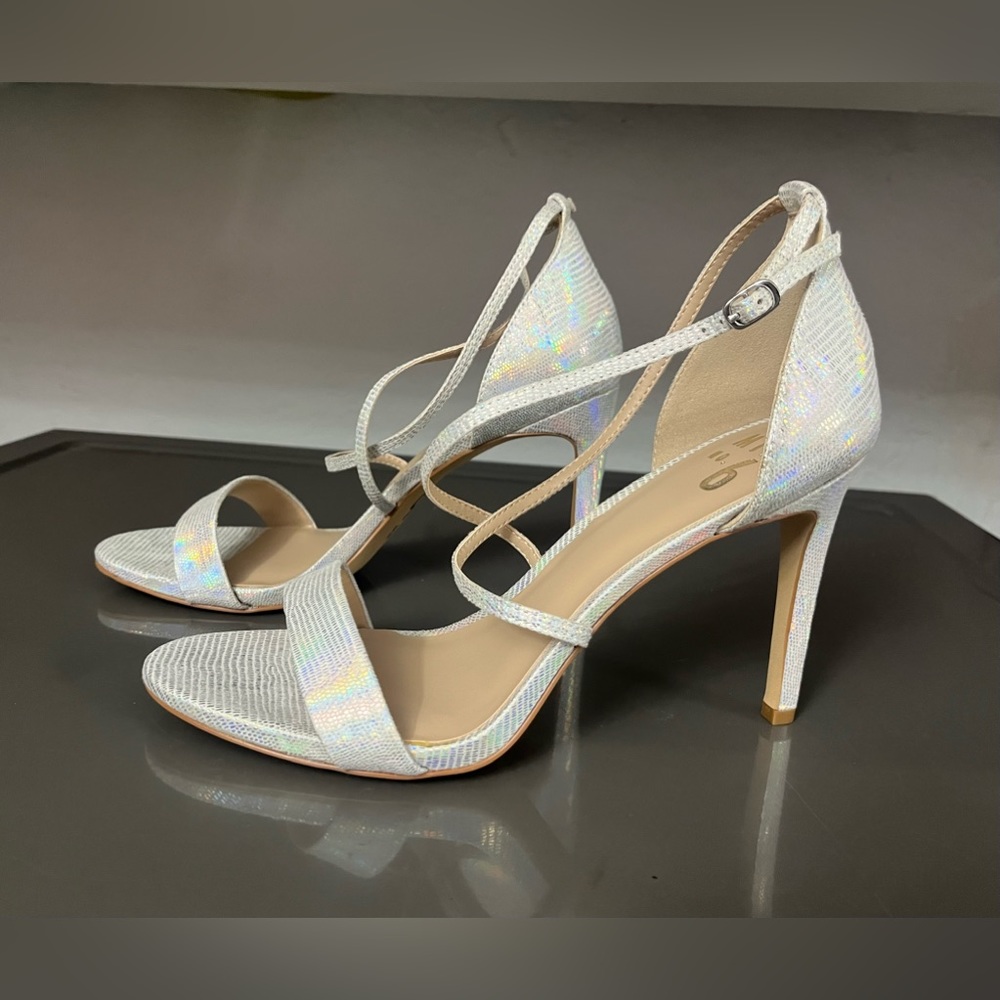 Mix No. 6 high heel Silver metallic straps 
Size: 9 1/2 M
